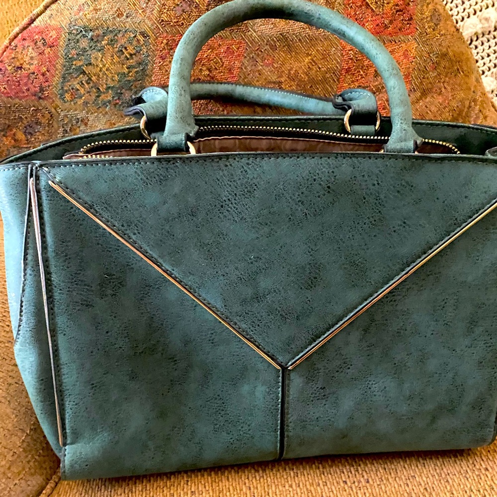 Dark green handbag.  Like new condition